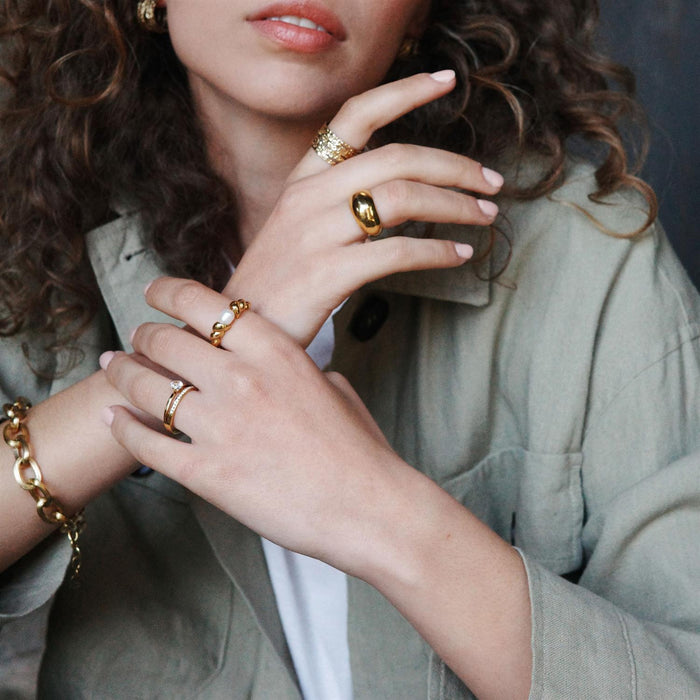 Ring, twisted, med ferskvannsperle, G