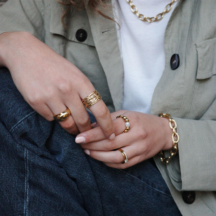 Ring, twisted, med ferskvannsperle, G